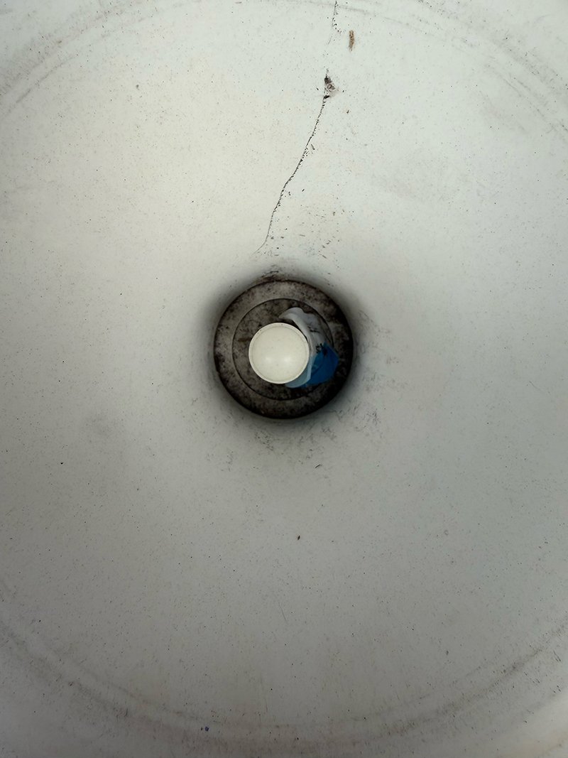 Old Water Cooler sink hole close up